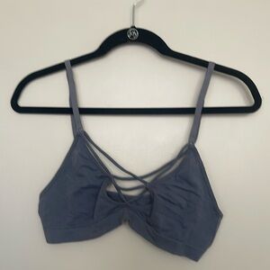 Light blue bra with cross straps on the front